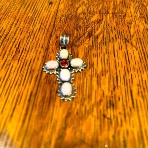 Sterling Silver Cross pendant. Stones light pink and red or orange middle stone